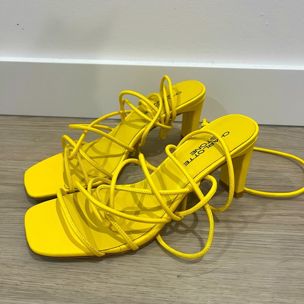 Never worn Charlotte Stone yellow lace up heels